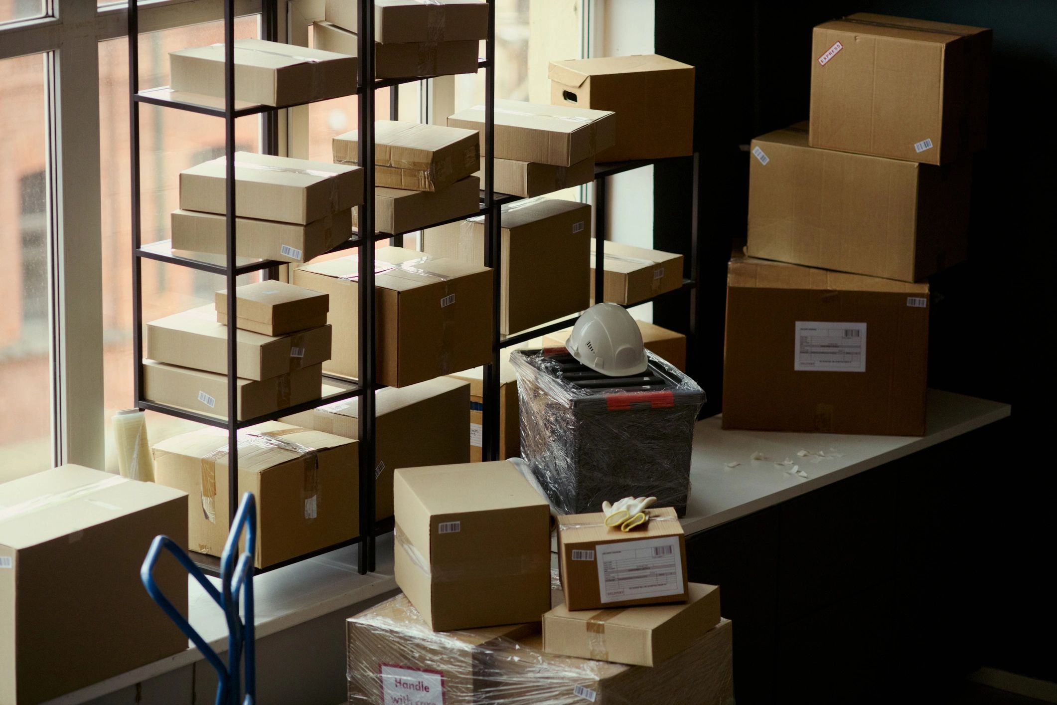 Stacked shipping packages in warehouse fulfillment area